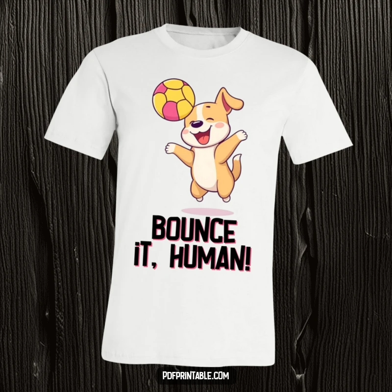 Funny happy dog jumping to bounce a colorful ball high in the air on a t-shirt, celebrating active, joyful moments.