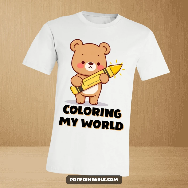 Funny kawaii bear holding a giant crayon, drawing a happy sun, printed on a comfortable and cheerful t-shirt.
